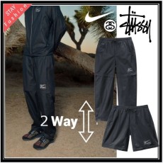 나이키 X 스투시 셋업 2WAY Storm-FIT 컨버터블 트랙팬츠